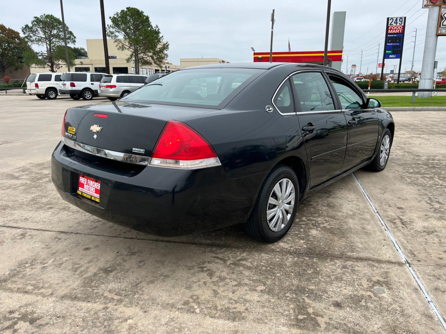 2008 Black /gray Chevrolet Impala LS (2G1WB55K381) with an 3.5L V6 OHV 16V FFV engine, 4-Speed Automatic Overdrive transmission, located at 14700 Tomball Parkway 249, Houston, TX, 77086, (281) 444-2200, 29.928619, -95.504074 - Photo#6